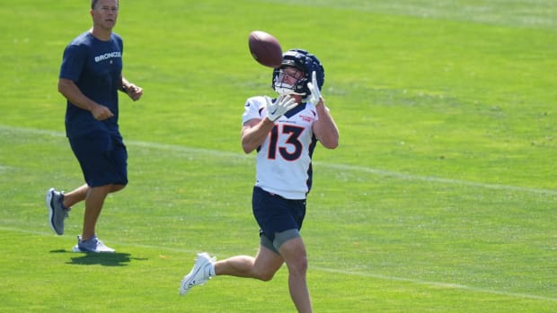 Denver Broncos wide receiver Taylor Grimes (13) during training camp drills at the Centura Health Training Center.